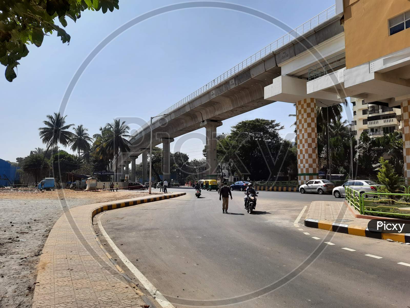 Closeup of beautiful view of Green Line Namma Metro Konanakunte Cross Metro Station and landmark building with nature background