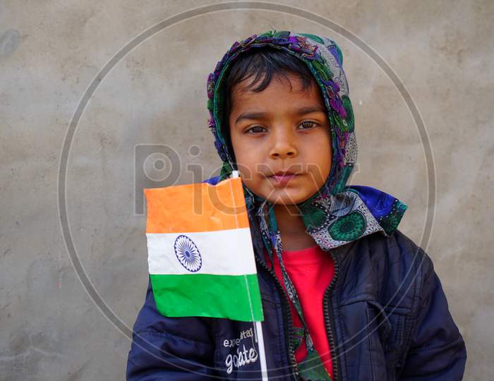 26 January 2021 Or 72 Th Constitution Establishment Day Special. Cute Joyful Girl Celebrating The Independence Day With The Tricolor Indian Flag.