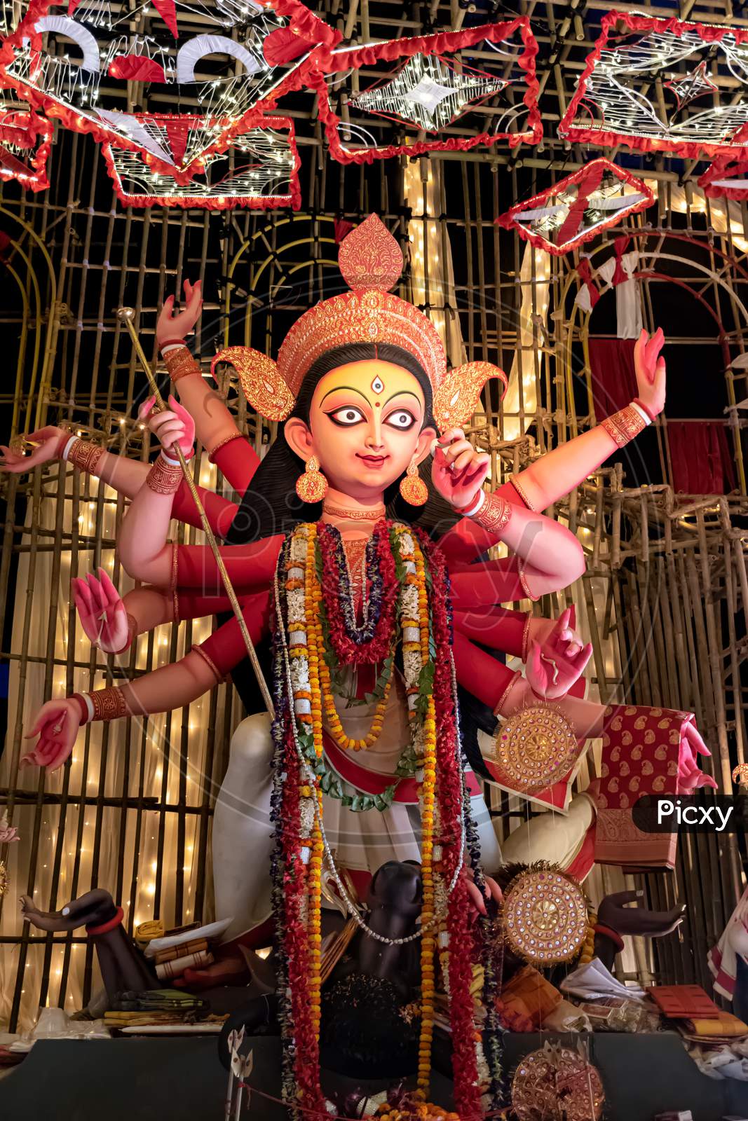 Image of Goddess Durga Idol Decorated At Puja Pandal In Kolkata, West Bengal,  India. Durga Puja Is Biggest Religious Festival Of Hinduism And Is Now  Celebrated Worldwide.-PS516756-Picxy