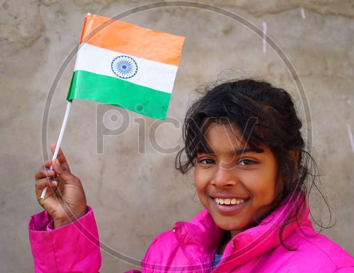 Tricolor National Flag Closeup. Cheerful Girl Remembering The National Patriot On The 72 Th Constitution Establishment Day.