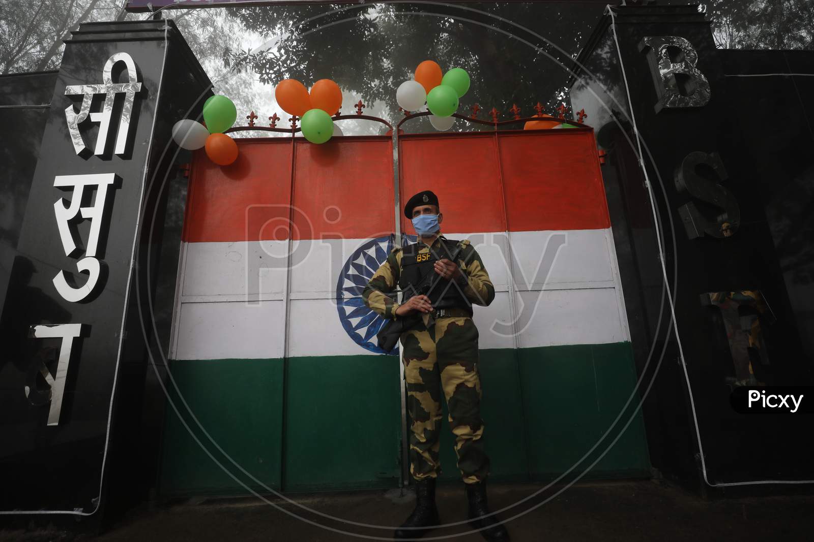 BSF Soldier stand guard at octroi post in Suchatgarh on the occession of Republic day celebration in Jammu ,26,JAN,2021.