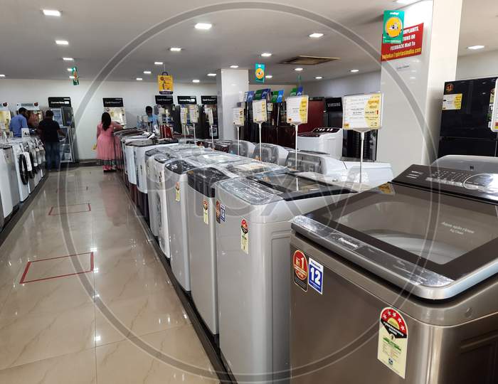 Closeup Of New Washing Machine, Mobile, Steamed Iron Box In A Girias Electronics Showroom At Gokul Extension, Mathikere