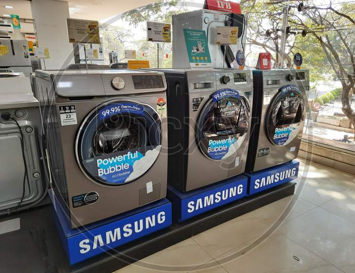 Closeup Of New Washing Machine, Mobile, Steamed Iron Box In A Girias Electronics Showroom At Gokul Extension, Mathikere