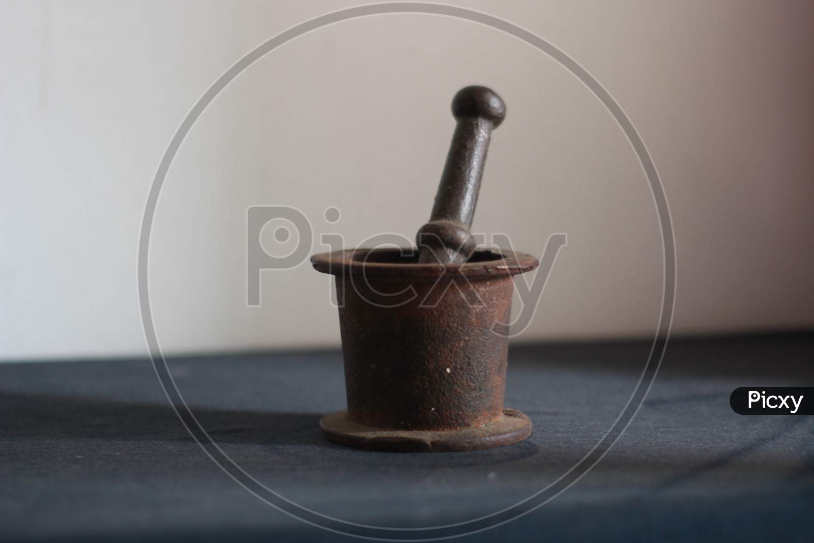 The beautiful old coffee grinder.