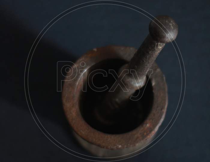 The Beautiful old mortar and pestle.