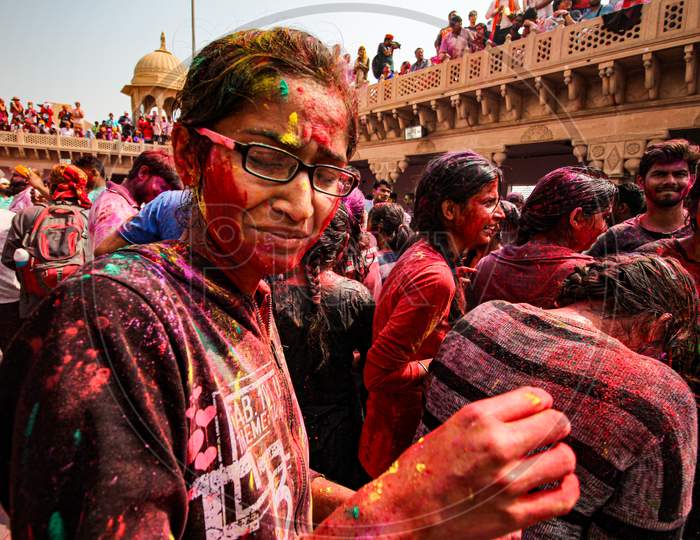 Mathura, Uttar Pradesh, India- January 28 2020:A Group Of Young Boys Playing And Enjoying The Festival Of Holi In The Holy State Of Mathura.Fully Covered In Colors. Enjoyment And Lifestyle Concept.