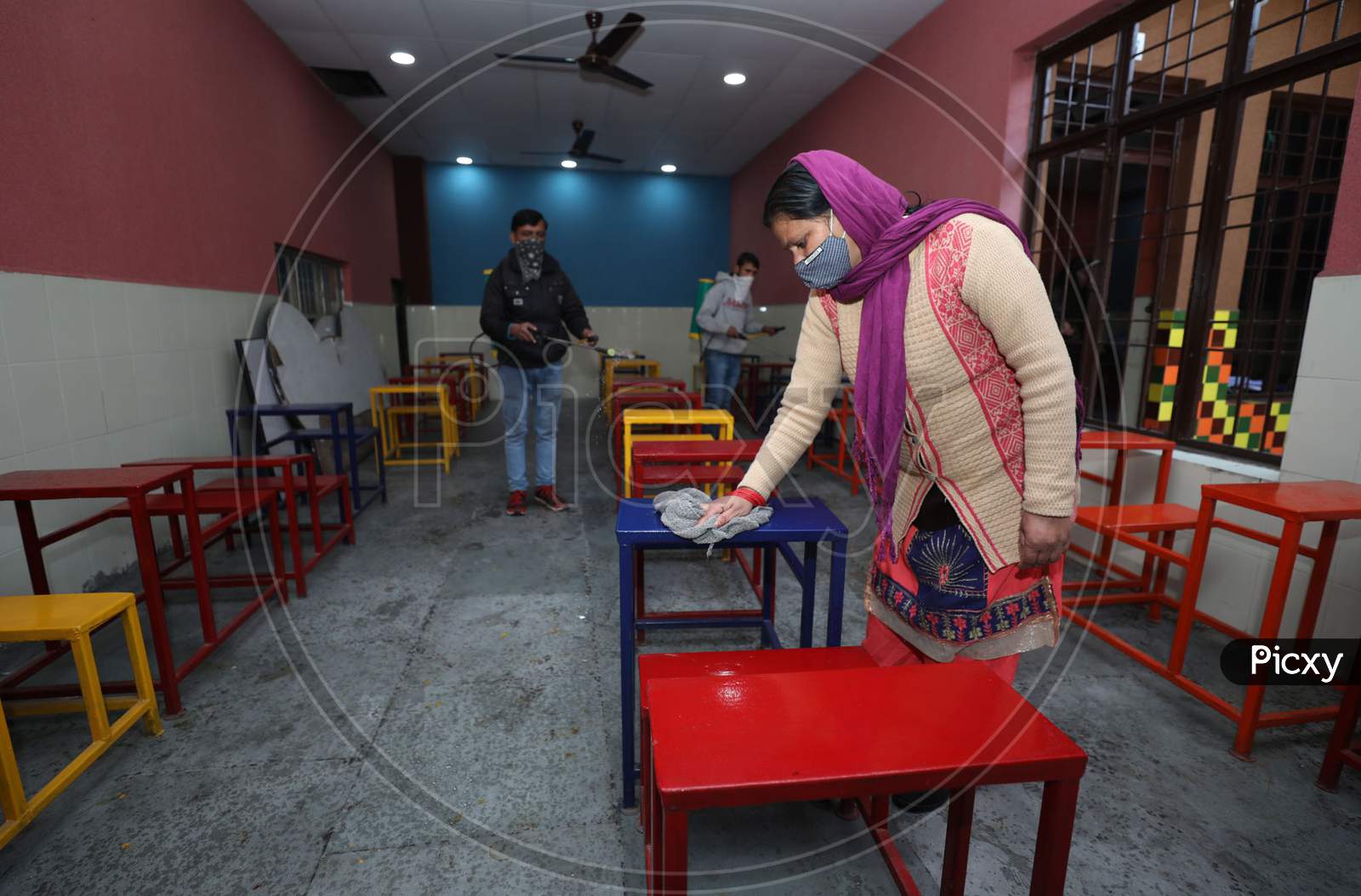 Preparations underway at a school in Jammu ahead of reopening of educational institutions next week after over 10 months closure due to Coronavirus pandemic. 28,Jan,2021.
