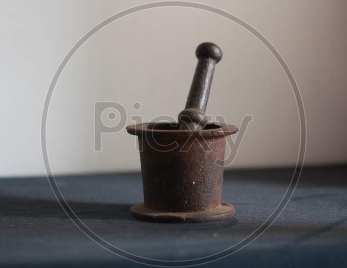 The beautiful old coffee grinder.