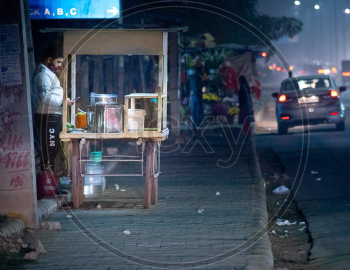 Street Side Food Cart Vendor Waiting For Customers On An Empty Street During The Covid19 Lockdown And Unlock During The Delhi Winters