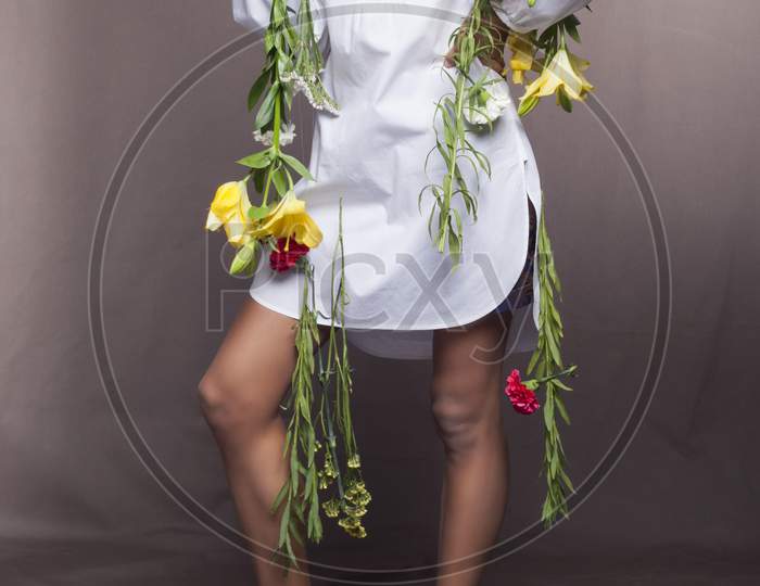 Fashion Photo Of Young Magnificent Woman In White Dress. Studio Photo