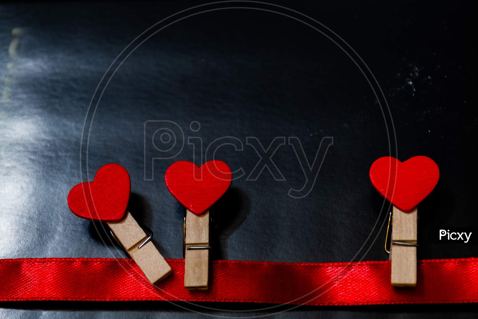Red hearts Love And valentines Day Concept on an isolated colorful Background