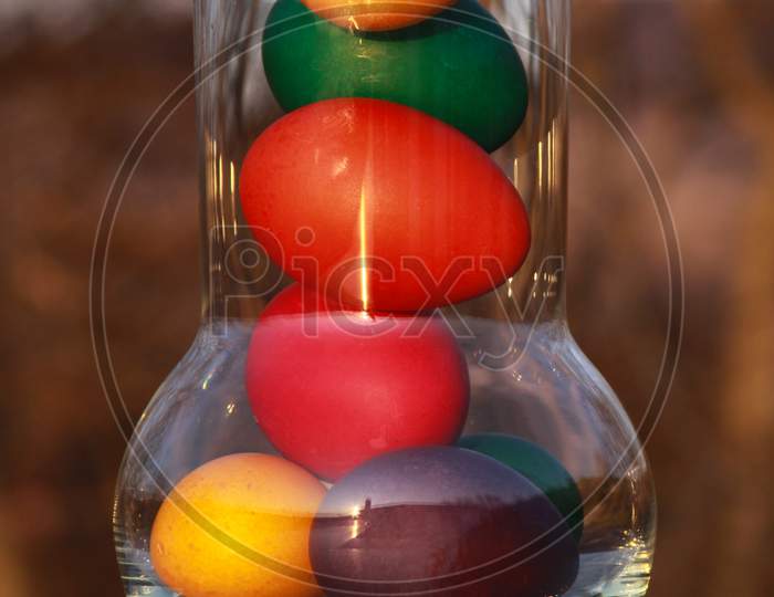 Easter Eggs In Glass Vase Or Carafe Concept Idea