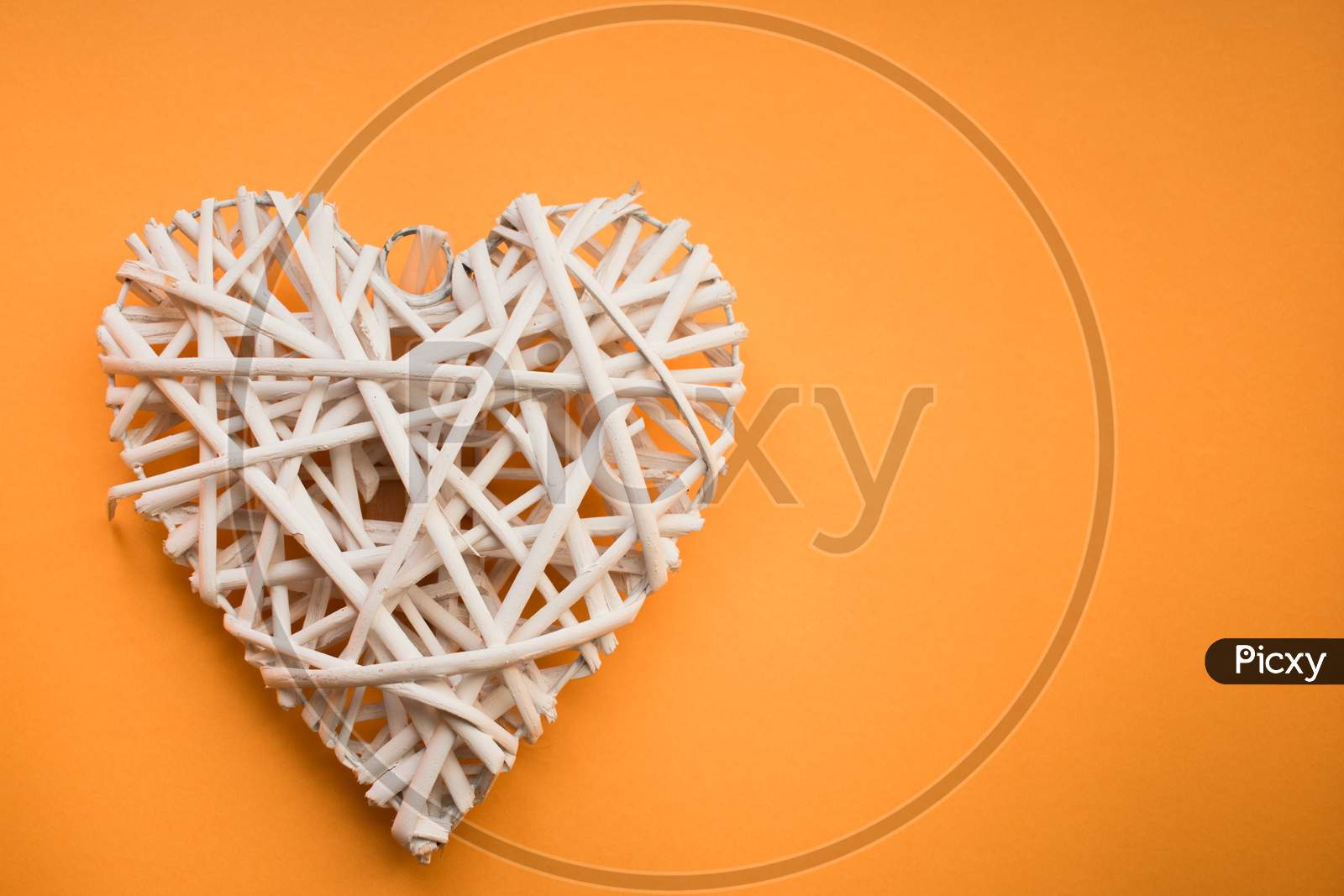 Wooden Heart On Yellow Background For Valentine'S Day.