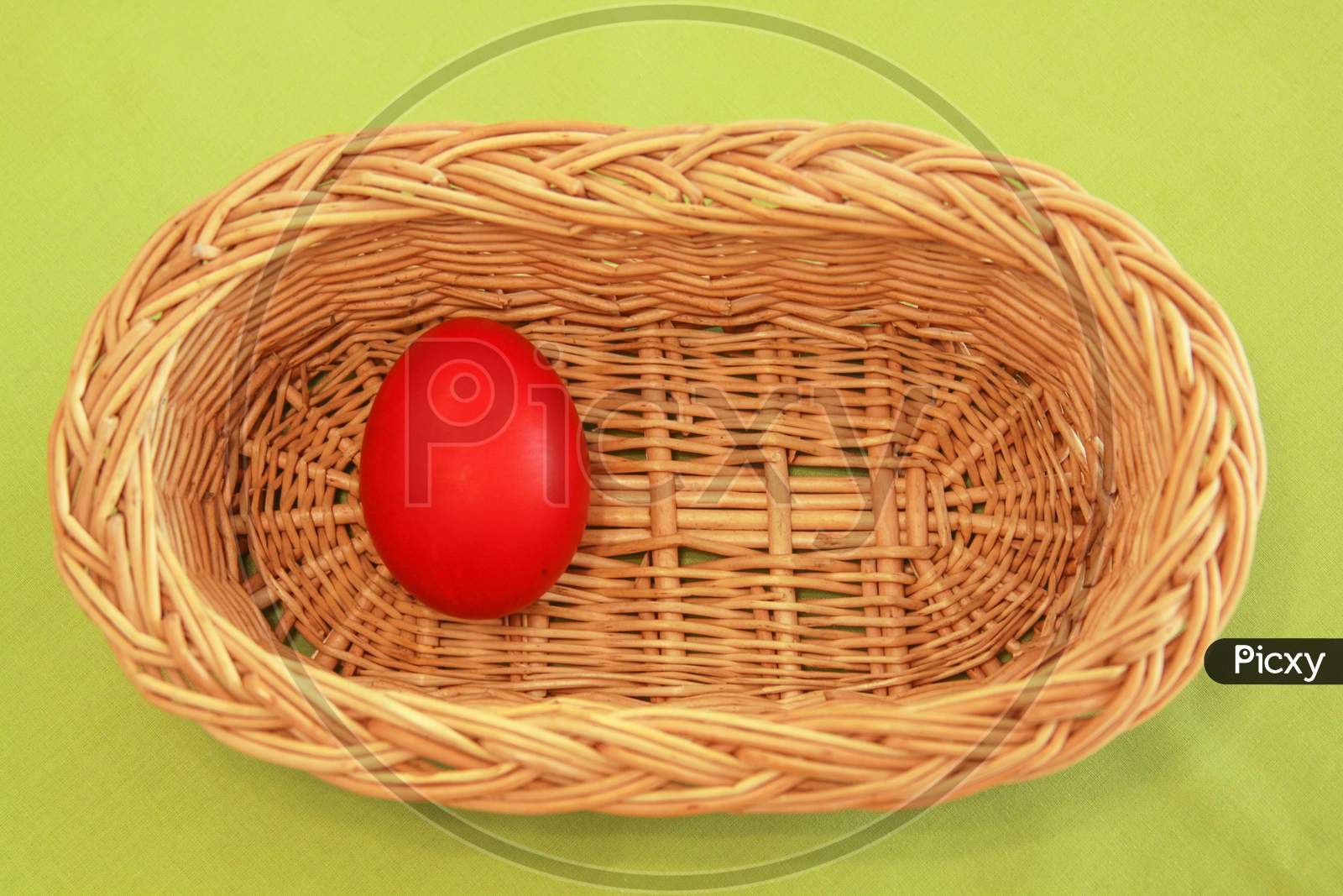 One Easter Egg In Basket