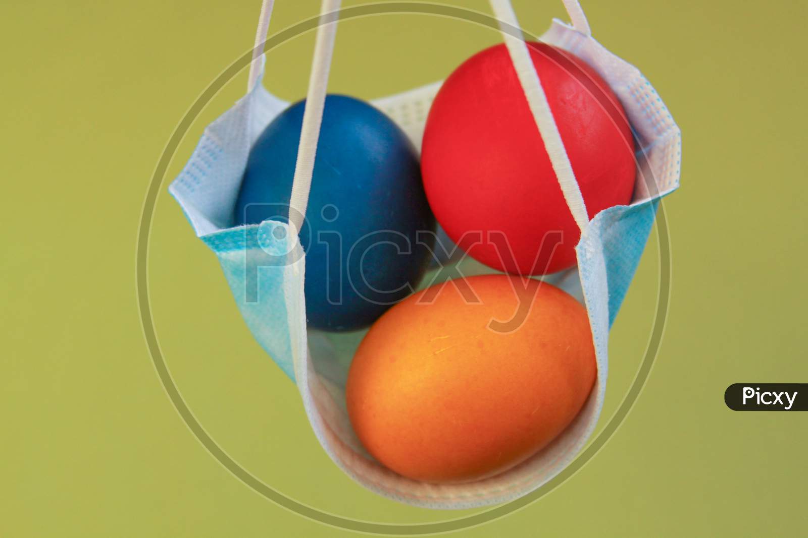 Vivid Colored Eggs In Medical Mask Easter 2020
