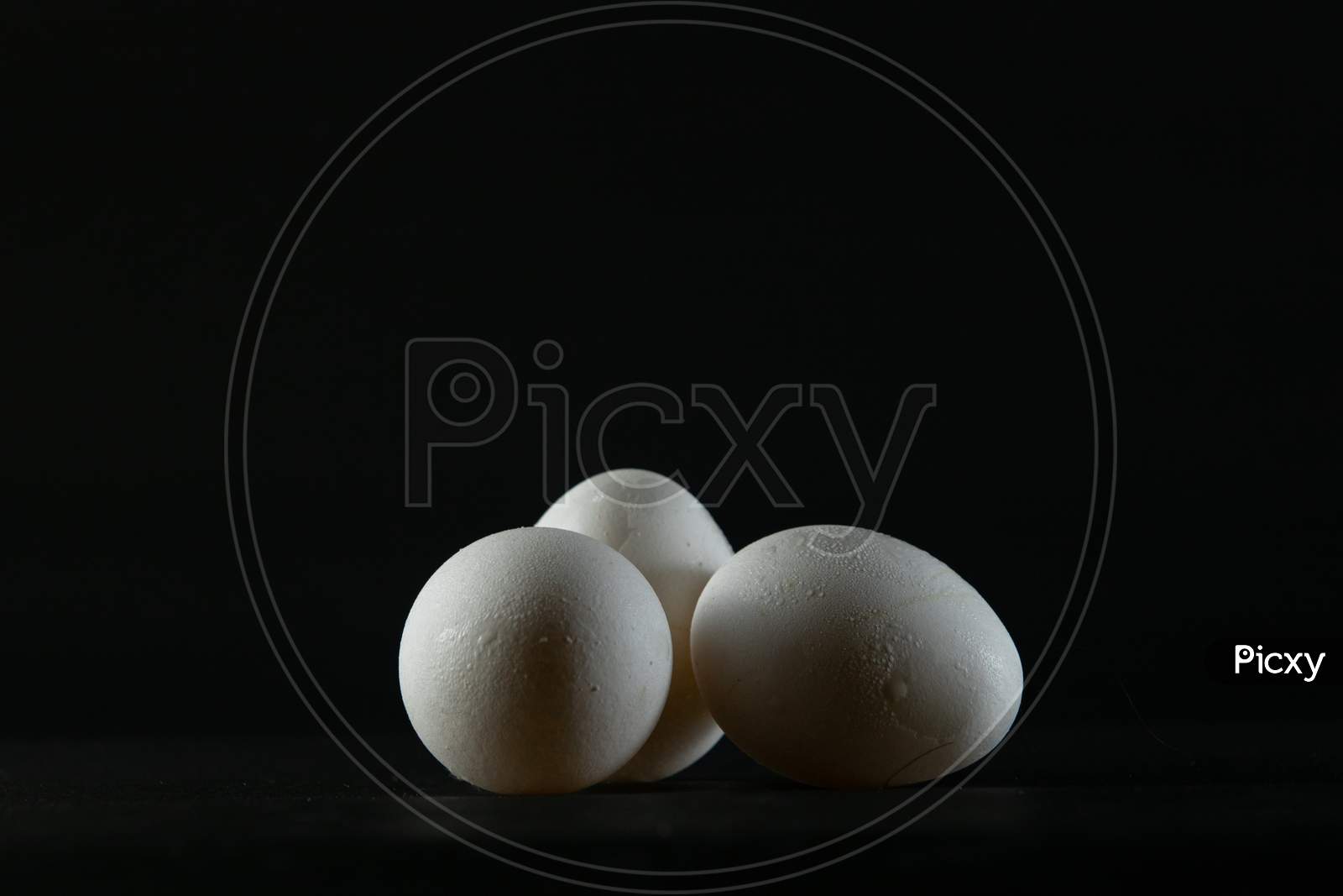 Eggs On Black Background