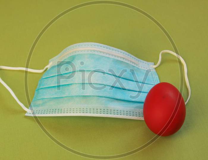 Surgical Face Mask And Red Easter Egg