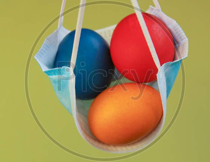 Vivid Colored Eggs In Medical Mask Easter 2020