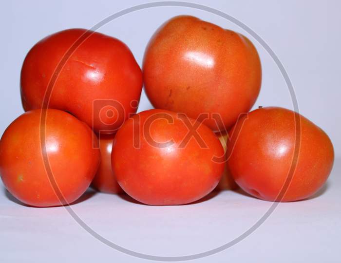 Solanum Lycopersicum, Many Red Colour Fresh Tomato With White Background.