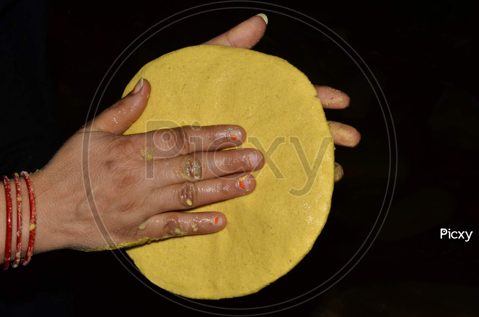 Corn Pone In Lady Hand With Black Background Himachal Pradesh India  1