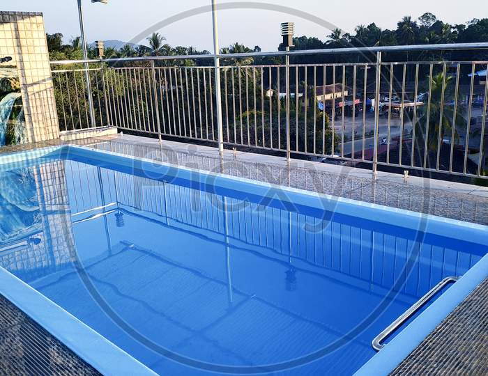 Blue Water Swimming Pool On Terrace Roof