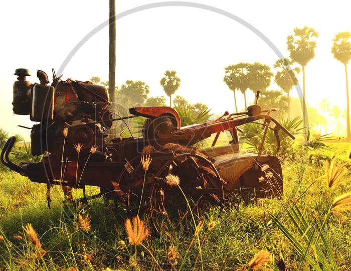 Old Tractor In The Sunrise View