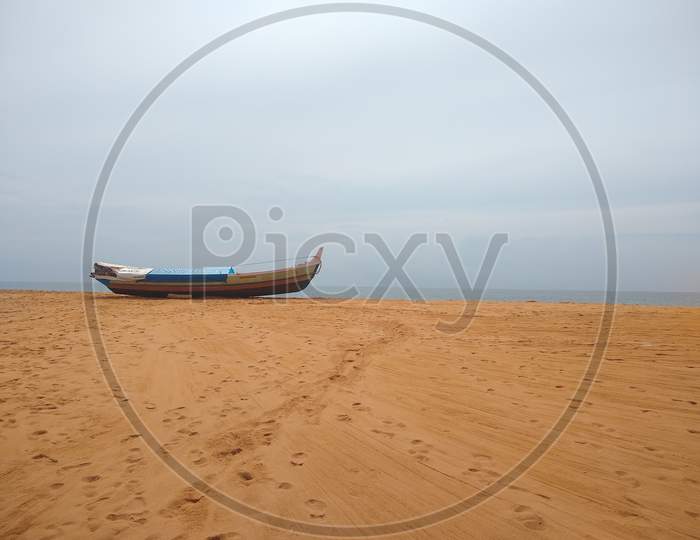 Fishing boat on the seashore seascape view