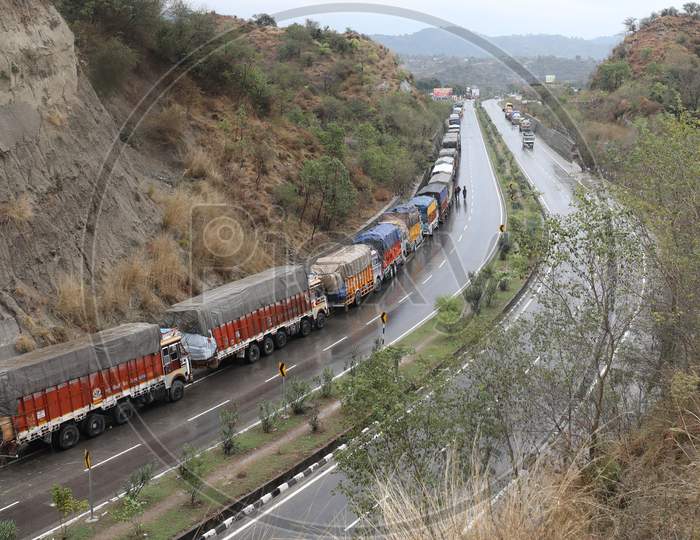 Stranded trucks along the Jammu-Srinagar national highway, which has been closed due to heavy snowfall in the Kashmir valley,  05,Jan,2021.