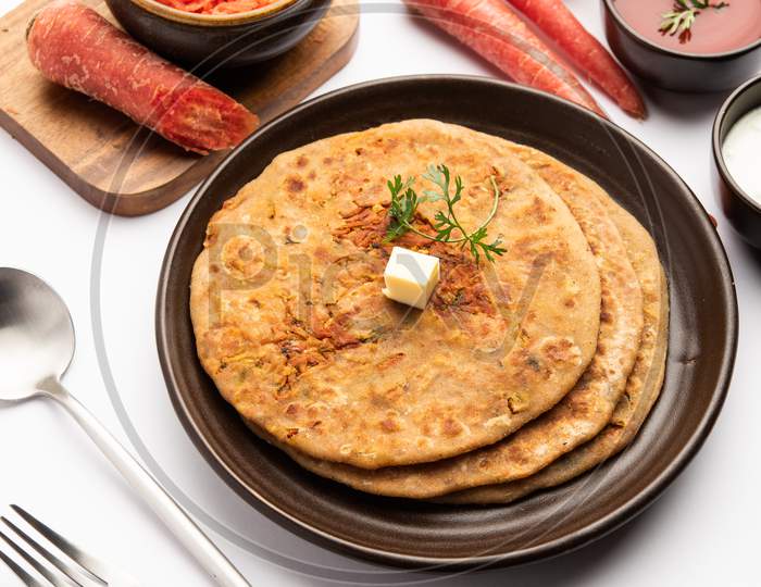 Gajar Ka Paratha Or Carrot Parotha Or Stuffed Flatbread Is A Seasonal Indian Breakfast Recipe