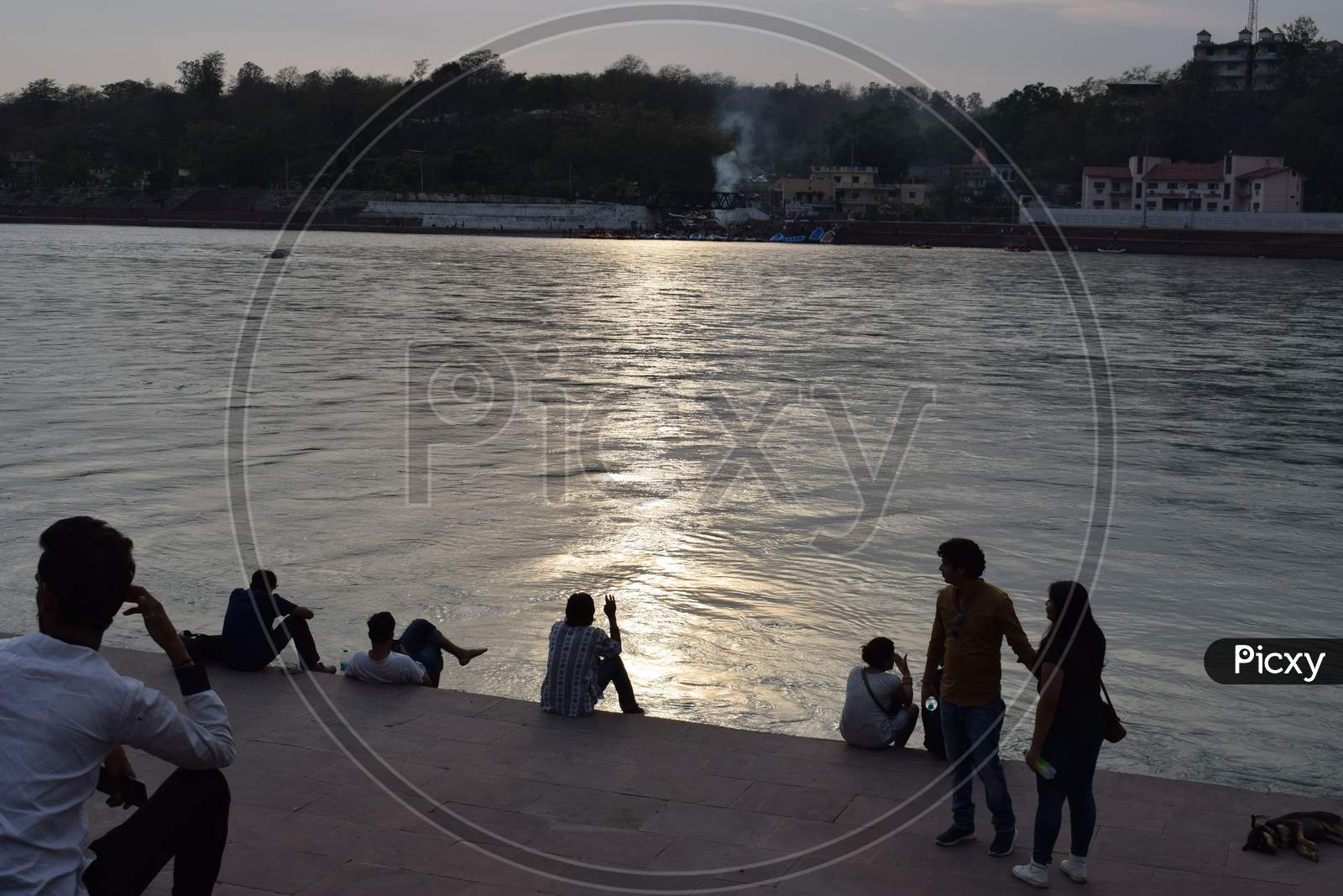 People sitting on River Ganges