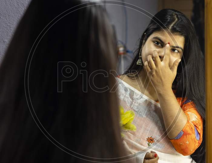 Indian Woman In Front Of Mirror