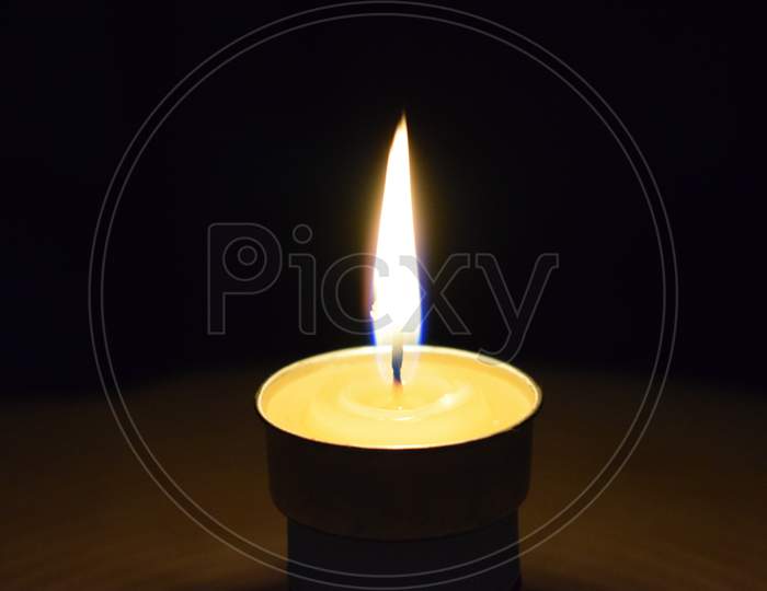 Candle and flower vase