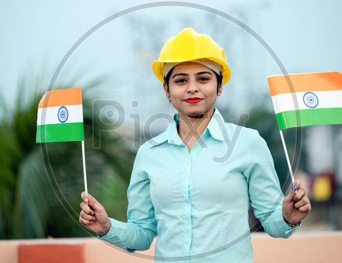 Beautiful Indian Girl In Formal Were With Indian National Tricolour Flag, Suitable For Independence Day Or Republic Day Concept.
