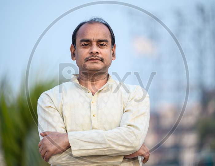 Portrait Of A Middle Aged Indian Man Stock Photo, Picture and