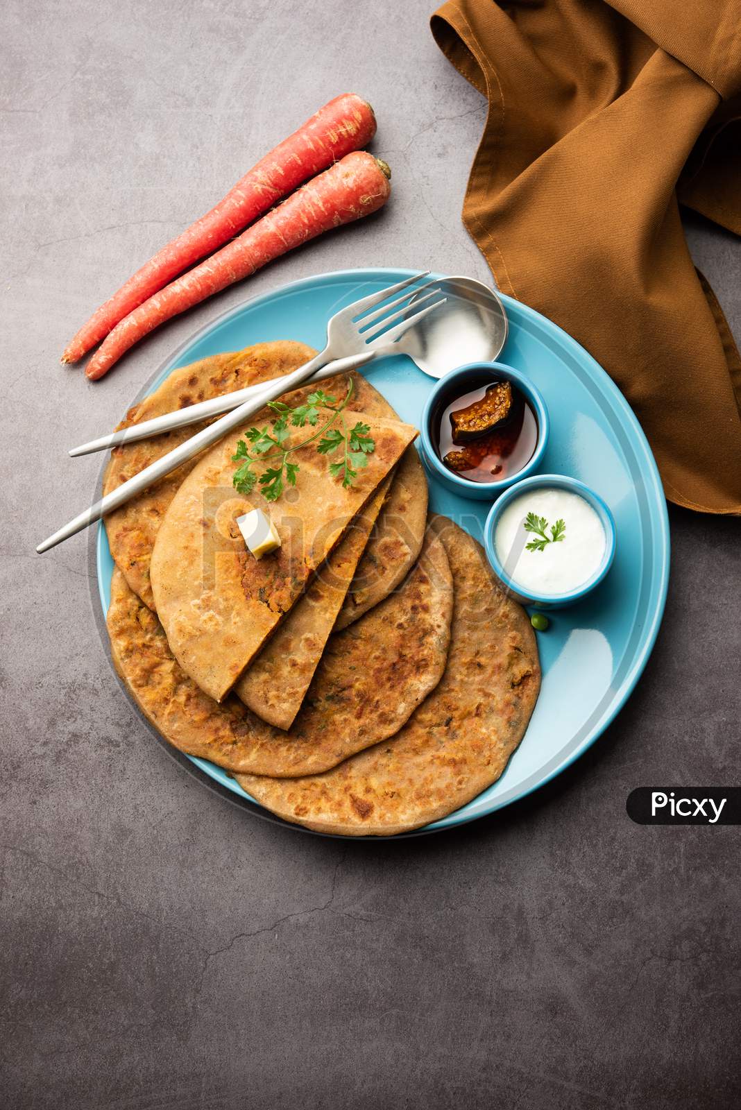 Gajar Ka Paratha Or Carrot Parotha Or Stuffed Flatbread Is A Seasonal Indian Breakfast Recipe