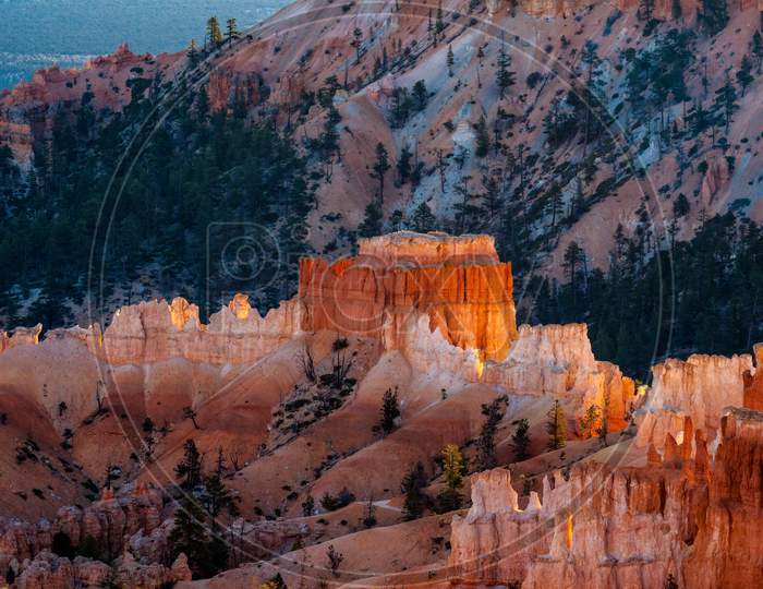 First Rays Of The Sun Striking Bryce Canyon