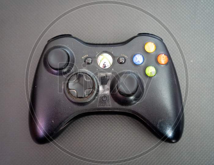 The Xbox Controller On A Carbon Fiber Background Showing Technology Of Inputs For Computer Gaming