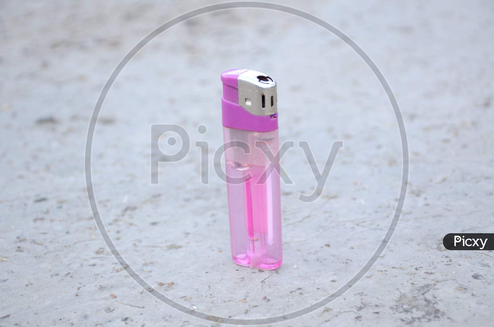 The Purple Color Gas Lighter Isolated On Grey Background.