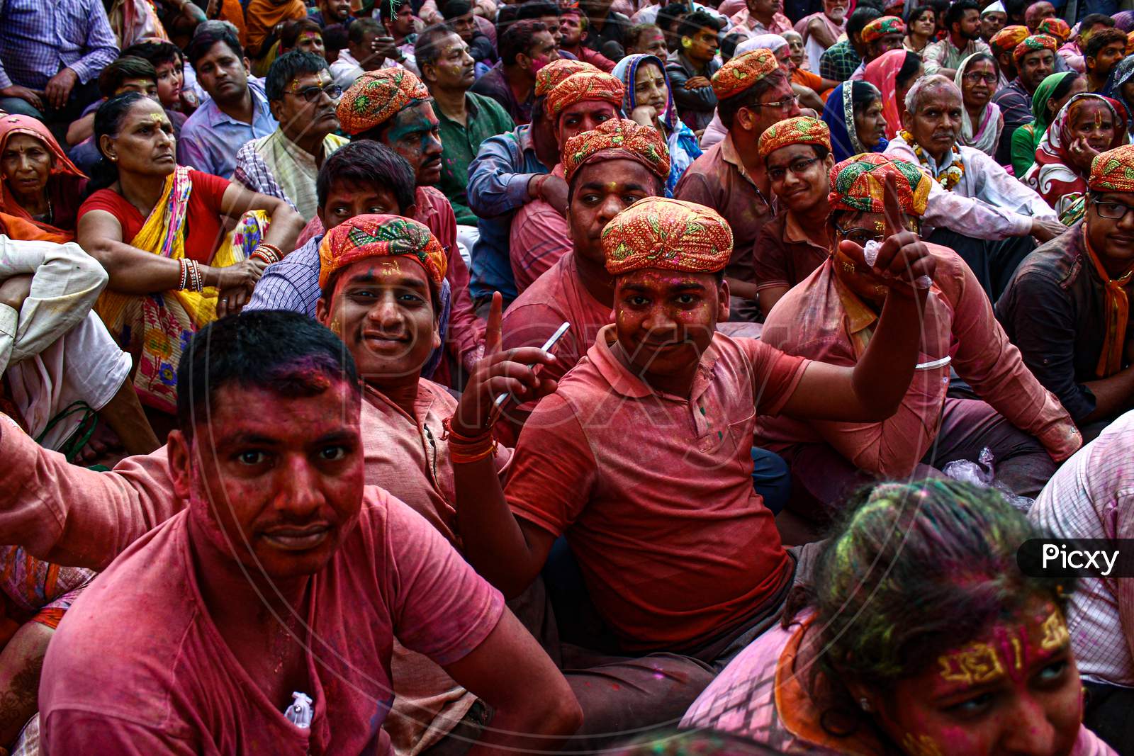 Mathura, Uttar Pradesh/ India- January 6 2020: A Group Of People Gathered On The Streets Of Mathura During The Holi Festival Of Colors. Concepts About Fun, Fun At A Holi Festival.