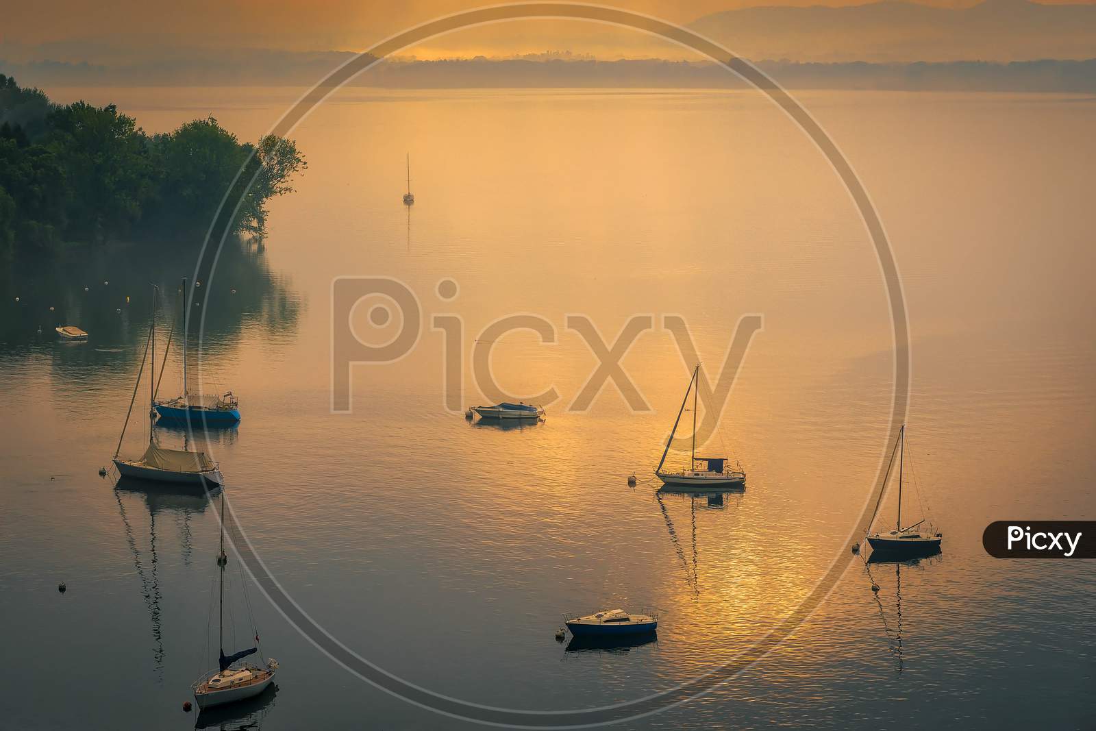 Yachts In The Early Morning Mist At Lesa Lake Maggiore