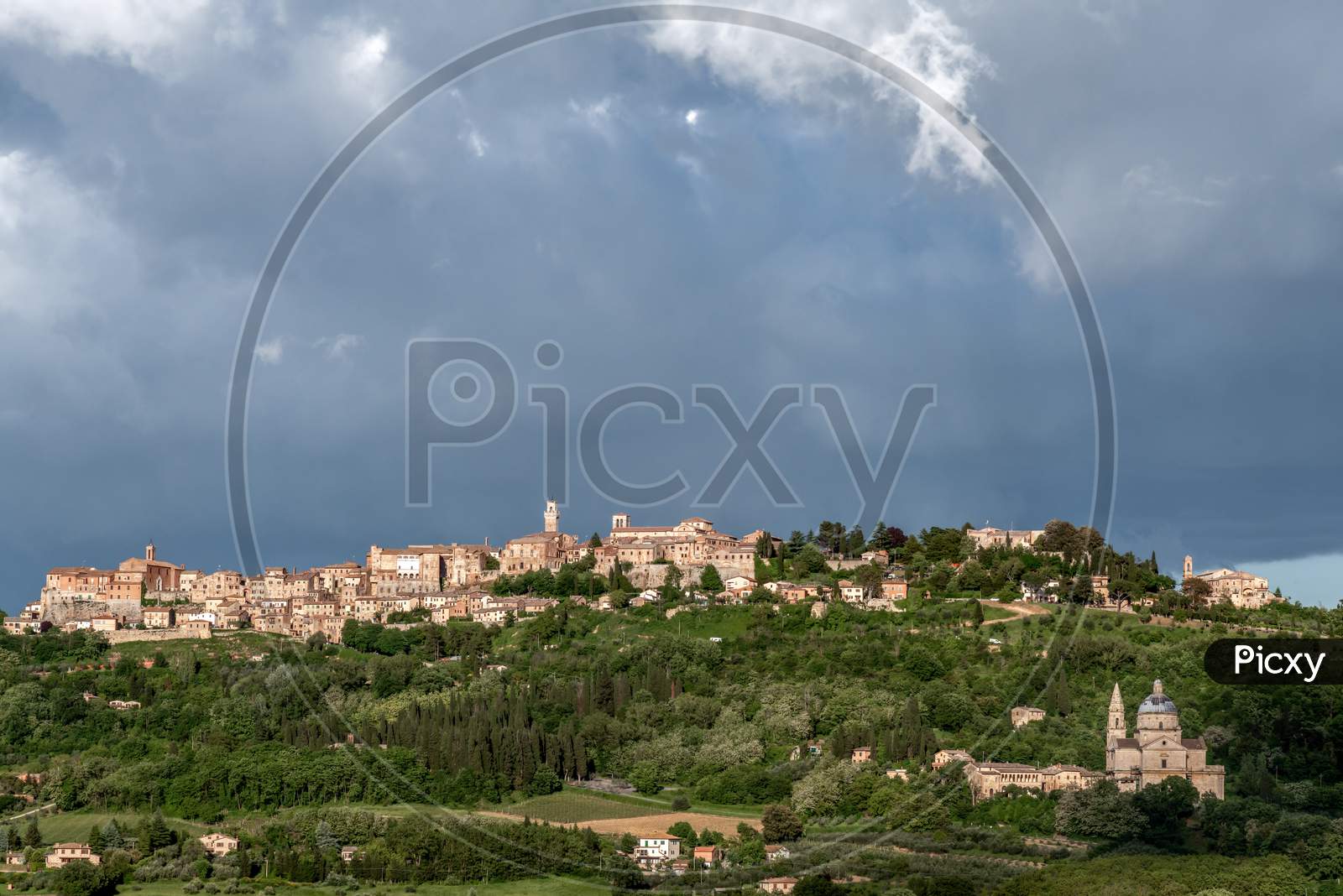 View Of Montepulciano And San Biagio Under Stormy Conditions