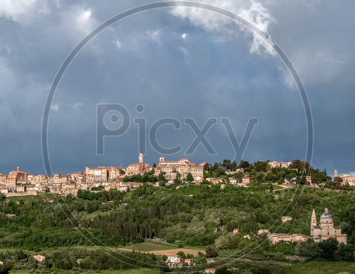 View Of Montepulciano And San Biagio Under Stormy Conditions