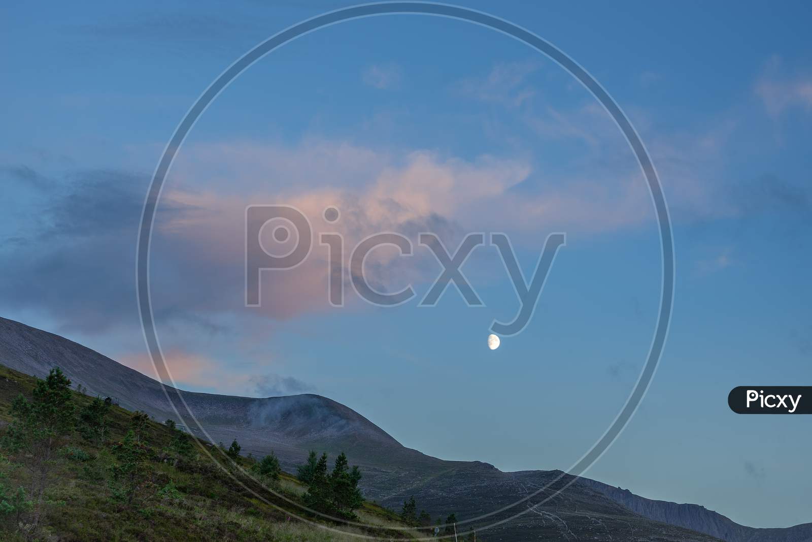 Moon Rising Over The Cairngorm Mountains