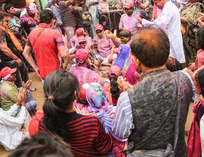 Mathura, Uttar Pradesh/ India- January 6 2020: Local People Taking Photo Dancing And Enjoying Music On The Street Of Mathura Celebrating Holi Festival With Colors.
