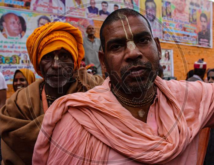 Mathura, Uttar Pradesh/ India- January 6 2020: Wide Angled Portrait Indian Monk ( Sadhu Baba) Roaming In The Streets Of Mathura During Holi Festival With Traditional Marking On His Face.