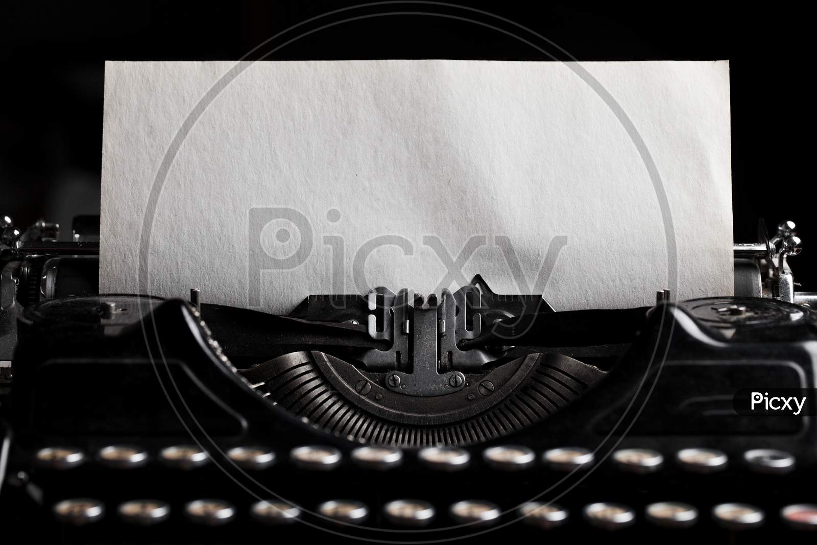 Typewriter With Paper Sheet. Space For Your Text