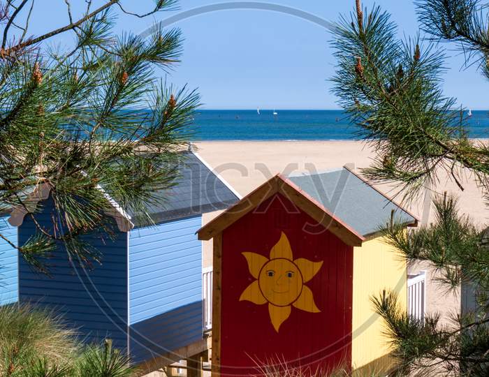 Some Brightly Coloured Beach Huts In Wells Next The Sea