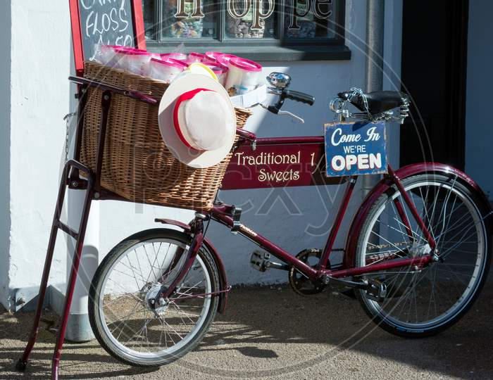 View Of An Old Tradesman Bicycle Outside A Sweet Shop In Penarth