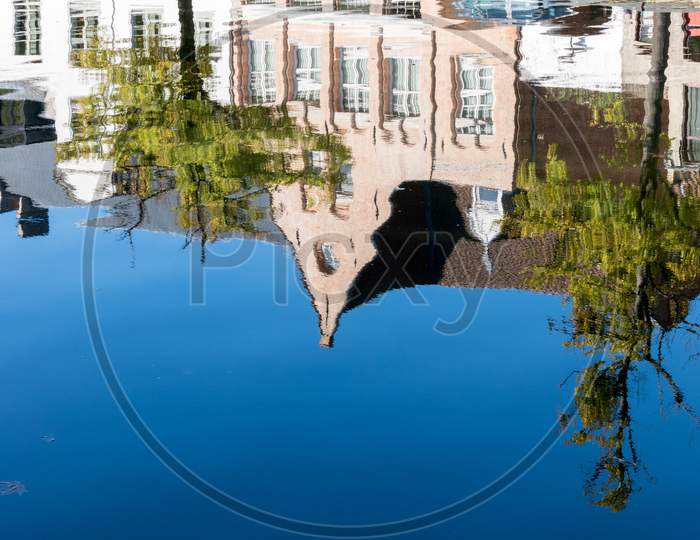 Reflection In A Canal In Bruges