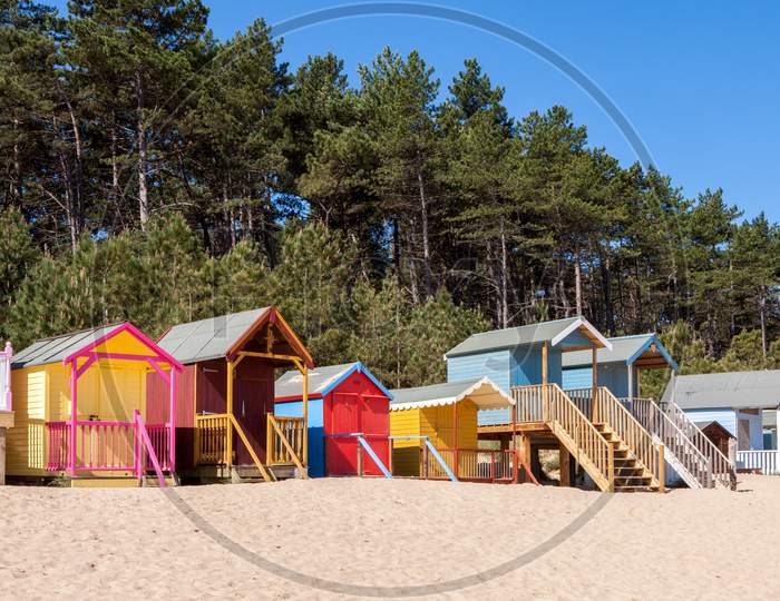 Some Brightly Coloured Beach Huts In Wells Next The Sea